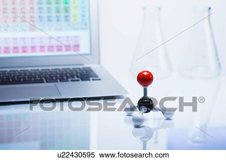 Chemistry research. Ball-and-stick molecular model with laptop computer displaying periodic table View Large Photo Image Stock Photography - Chemistry research. Ball-and-stick molecular model with laptop computer displaying periodic table. Fotosearch