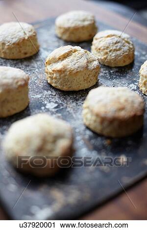 Close up of freshly baked scones on baking tray View Large Photo Image Stock Image - Close up of freshly baked scones on baking tray. Fotosearch