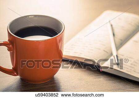 Close up still life of black coffee, notebook and pen View Large Photo Image Stock Image - Close up still life of black coffee, notebook and pen. Fotosearch