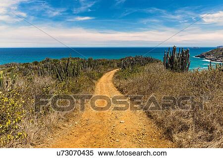 Stock Photography - Coastal dirt track at Boca da Barra, Buzios, Rio de Janeiro, Brazil. Fotosearch