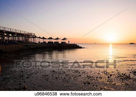 Stock Photo - Coastline at sunset, Hurgada, Red Sea, Egypt. Fotosearch