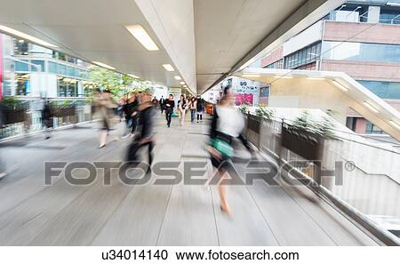 Commuters rushing, blurred motion, Hong Kong, China View Large Photo Image Stock Image - Commuters rushing, blurred motion, Hong Kong, China. Fotosearch