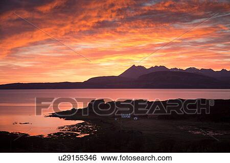 Stock Photograph - Cuillin mountains at sunset, Isle of Skye, Hebrides, Scotland. Fotosearch