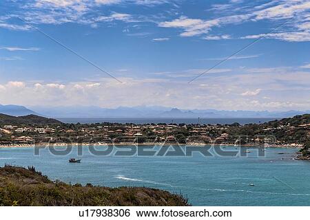 Stock Photograph - Distant view of coast, Ferradura, Buzios, Rio de Janeiro, Brazil. Fotosearch