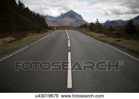 Stock Photo - Empty road, Isle of Skye, Hebrides, Scotland. Fotosearch