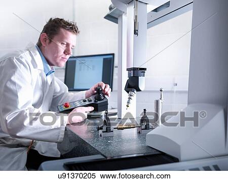 Engineer measuring parts in quality control room View Large Photo Image Stock Photography - Engineer measuring parts in quality control room. Fotosearch