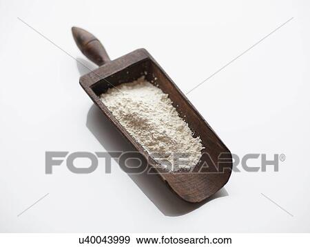 Flour in wooden scoop View Large Photo Image Stock Photo - Flour in wooden scoop. Fotosearch