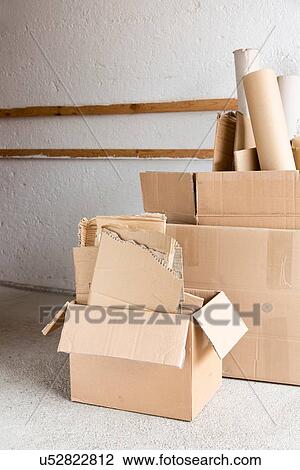 Full cardboard boxes in garage for recycling View Large Photo Image Stock Image - Full cardboard boxes in garage for recycling. Fotosearch