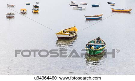 Stock Image - Group of anchored rowing boats, Manguinhos, Buzios, Rio de Janeiro, Brazil. Fotosearch