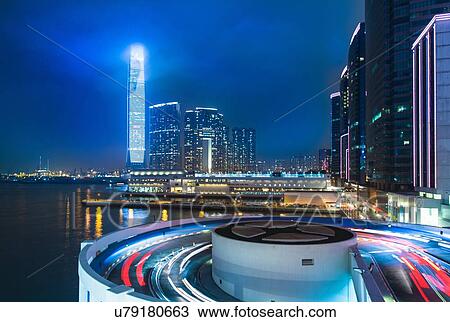 Kowloon business district: skyline with ICC building and cruise terminal at night, Hong Kong, China View Large Photo Image Stock Image - Kowloon business district: skyline with ICC building and cruise terminal at night, Hong Kong, China. Fotosearch