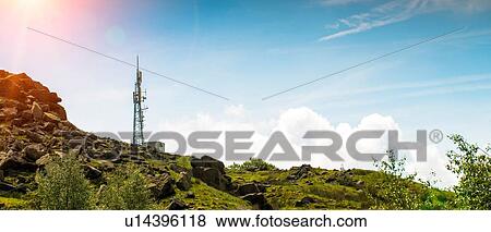 Low angle panoramic view of cell phone mast on hill, UK View Large Photo Image Stock Photo - Low angle panoramic view of cell phone mast on hill, UK. Fotosearch