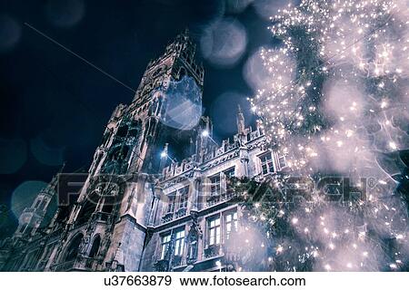 Low angle view of The New Rathaus (Town Hall) and Christmas tree at night, Munich, Germany View Large Photo Image Stock Photo - Low angle view of The New Rathaus (Town Hall) and Christmas tree at night, Munich, Germany. Fotosearch