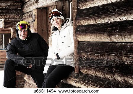 Man and woman by chalet, portrait View Large Photo Image Picture - Man and woman by chalet, portrait. Fotosearch