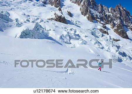 Mature female skier celebrating on Mont Blanc massif, Graian Alps, France View Large Photo Image Picture - Mature female skier celebrating on Mont Blanc massif, Graian Alps, France. Fotosearch