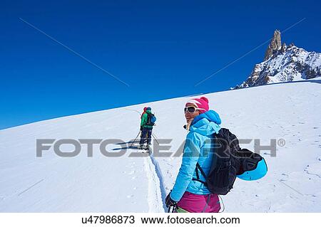 Mature female skier looking out from Mont Blanc massif, Graian Alps, France View Large Photo Image Stock Image - Mature female skier looking out from Mont Blanc massif, Graian Alps, France. Fotosearch