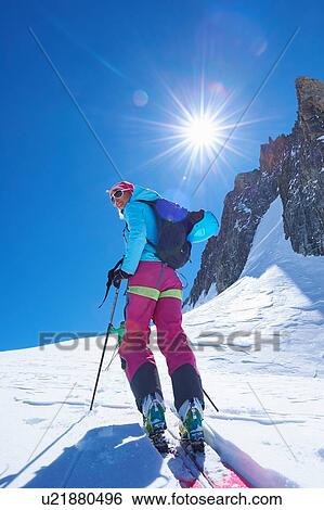 Mature female skier moving up Mont Blanc massif, Graian Alps, France View Large Photo Image Stock Photograph - Mature female skier moving up Mont Blanc massif, Graian Alps, France. Fotosearch