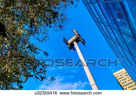 Miniature windmill next to shopping centre, Manchester, UK View Large Photo Image Stock Photograph - Miniature windmill next to shopping centre, Manchester, UK. Fotosearch
