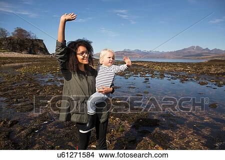 Picture - Mother and son waving, Loch Eishort, Isle of Skye, Hebrides, Scotland. Fotosearch