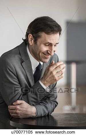 Portrait of mature businessman, laughing View Large Photo Image Stock Photography - Portrait of mature businessman, laughing. Fotosearch