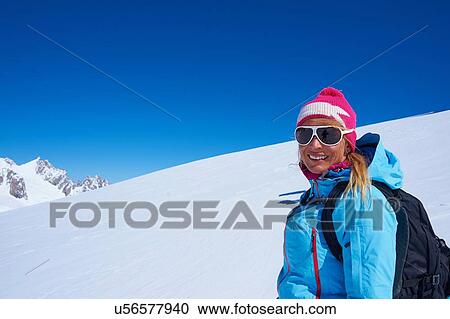 Portrait of mature female skier on Mont Blanc massif, Graian Alps, France View Large Photo Image Stock Image - Portrait of mature female skier on Mont Blanc massif, Graian Alps, France. Fotosearch