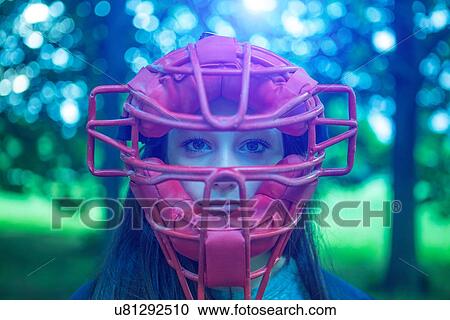 Portrait of staring teenage girl in park wearing red umpire mask View Large Photo Image Stock Image - Portrait of staring teenage girl in park wearing red umpire mask. Fotosearch