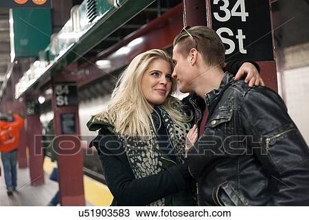 Romantic young couple waiting on New York City subway platform, New York, USA View Large Photo Image Stock Image - Romantic young couple waiting on New York City subway platform, New York, USA. Fotosearch