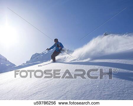 Stock Photograph - Skier at Combe de Gers, Flaine, France. Fotosearch