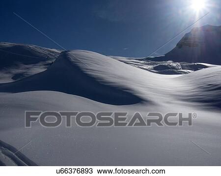 Snow-covered landscape at sunset, Flaine, France View Large Photo Image Stock Image - Snow-covered landscape at sunset, Flaine, France. Fotosearch