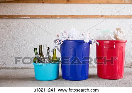 Three recycling buckets in garage with bottles, paper and plastic View Large Photo Image Stock Image - Three recycling buckets in garage with bottles, paper and plastic. Fotosearch