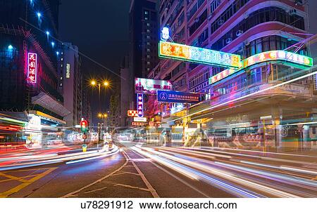 Stock Image - Traffic light trails at night, Hong Kong, China. Fotosearch