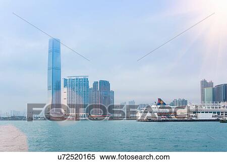 Stock Photography - View of Kowloon skyline across Victoria Harbour, Hong Kong, China. Fotosearch