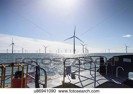 View of offshore windfarm from service boat at sea View Large Photo Image Stock Image - View of offshore windfarm from service boat at sea. Fotosearch