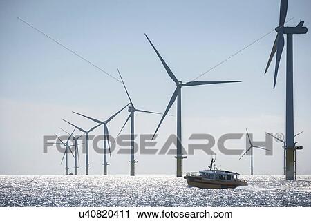 Stock Image - View of service boat at offshore windfarm. Fotosearch