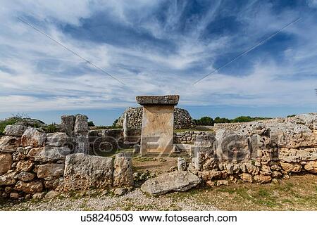 View of taula amongst ancient Talayotic ruins, Menorca, Spain View Large Photo Image Stock Image - View of taula amongst ancient Talayotic ruins, Menorca, Spain. Fotosearch