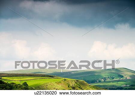 View of wind turbines on moorland hills, UK View Large Photo Image Stock Image - View of wind turbines on moorland hills, UK. Fotosearch