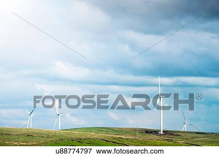 Stock Photo - View of wind turbines on moorland, UK. Fotosearch