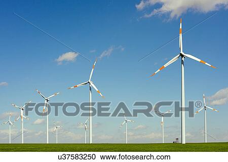 Stock Image - Windfarm, Garzweiler browncoal pit, Otzenrath, Nordrhein-Westfalen, Germany. Fotosearch