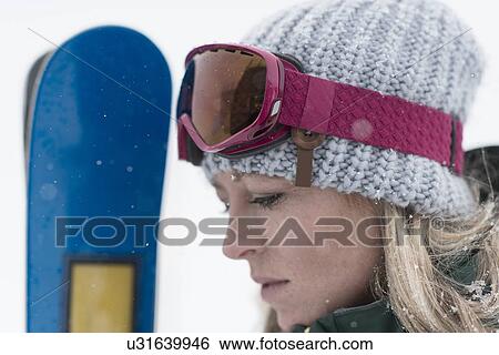 Woman wearing knit hat, close up View Large Photo Image Stock Photograph - Woman wearing knit hat, close up. Fotosearch