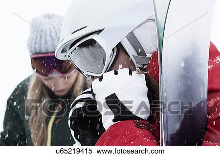 Woman wearing ski goggles and gloves, close up View Large Photo Image Stock Photography - Woman wearing ski goggles and gloves, close up. Fotosearch