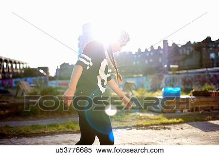Young women dancing in the sunlight, backlit View Large Photo Image Stock Photography - Young women dancing in the sunlight, backlit. Fotosearch