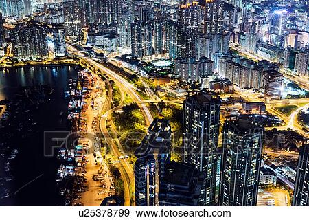 Aerial of Kowloon at night, with light trails, Hong Kong, China View Large Photo Image Stock Photo - Aerial of Kowloon at night, with light trails, Hong Kong, China. Fotosearch