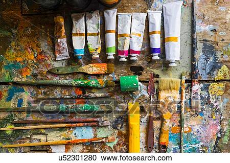 Stock Image - Artist materials, laid out on table, overhead view. Fotosearch