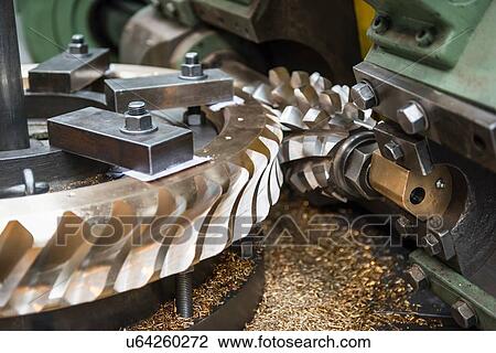 Bronze worm gear with specialist cutting tool in lathe in engineering factory, close up View Large Photo Image Stock Image - Bronze worm gear with specialist cutting tool in lathe in engineering factory, close up. Fotosearch