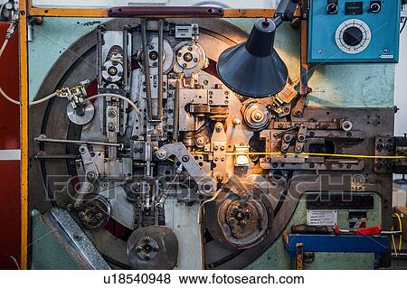 Stock Photo - Cable manufacturing machinery in factory that produces products for boating and camping. Fotosearch