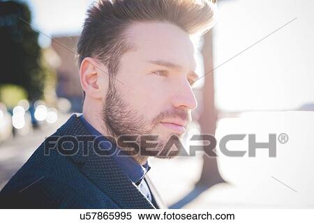Close up portrait of sunlit young man View Large Photo Image Stock Photography - Close up portrait of sunlit young man. Fotosearch