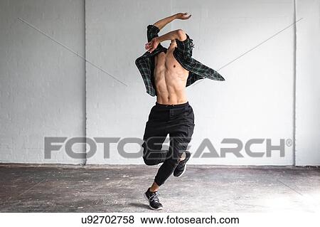 Dancer practising in studio View Large Photo Image Stock Photo - Dancer practising in studio. Fotosearch