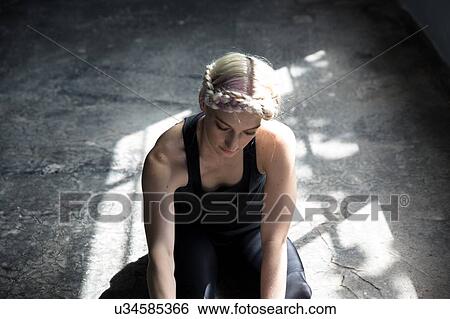 Dancer stretching in studio View Large Photo Image Stock Photograph - Dancer stretching in studio. Fotosearch