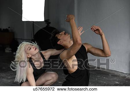 Dancers practising in studio View Large Photo Image Stock Image - Dancers practising in studio. Fotosearch