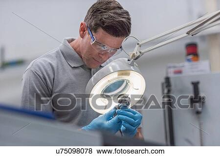 Engineer inspecting artificial hip joint in orthopaedic factory View Large Photo Image Stock Photo - Engineer inspecting artificial hip joint in orthopaedic factory. Fotosearch