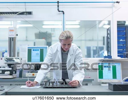 Female engineer inspecting artificial hip joint parts in quality control department in orthopaedic factory View Large Photo Image Stock Image - Female engineer inspecting artificial hip joint parts in quality control department in orthopaedic factory. Fotosearch